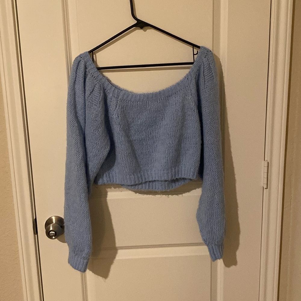 Cropped over the shoulder baby blue sweater